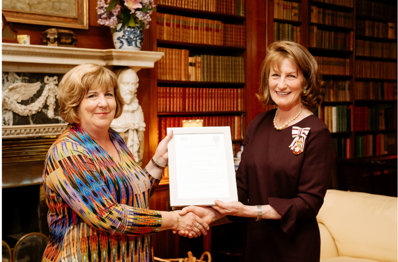 HM Lord-Lieutenant of Shropshire presenting Deputy-Lieutenant Gill Hamer with her commission