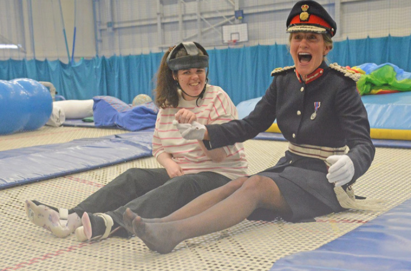 Shropshire's Lord-Lieutenant has a go on the trampoline with Abigail Croft